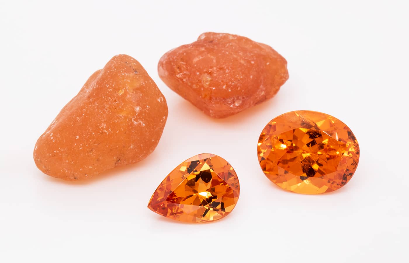  Gemhype 9.63-ct oval Mandarin garnet and a  4.4-ct pear-shaped Mandarin garnet 