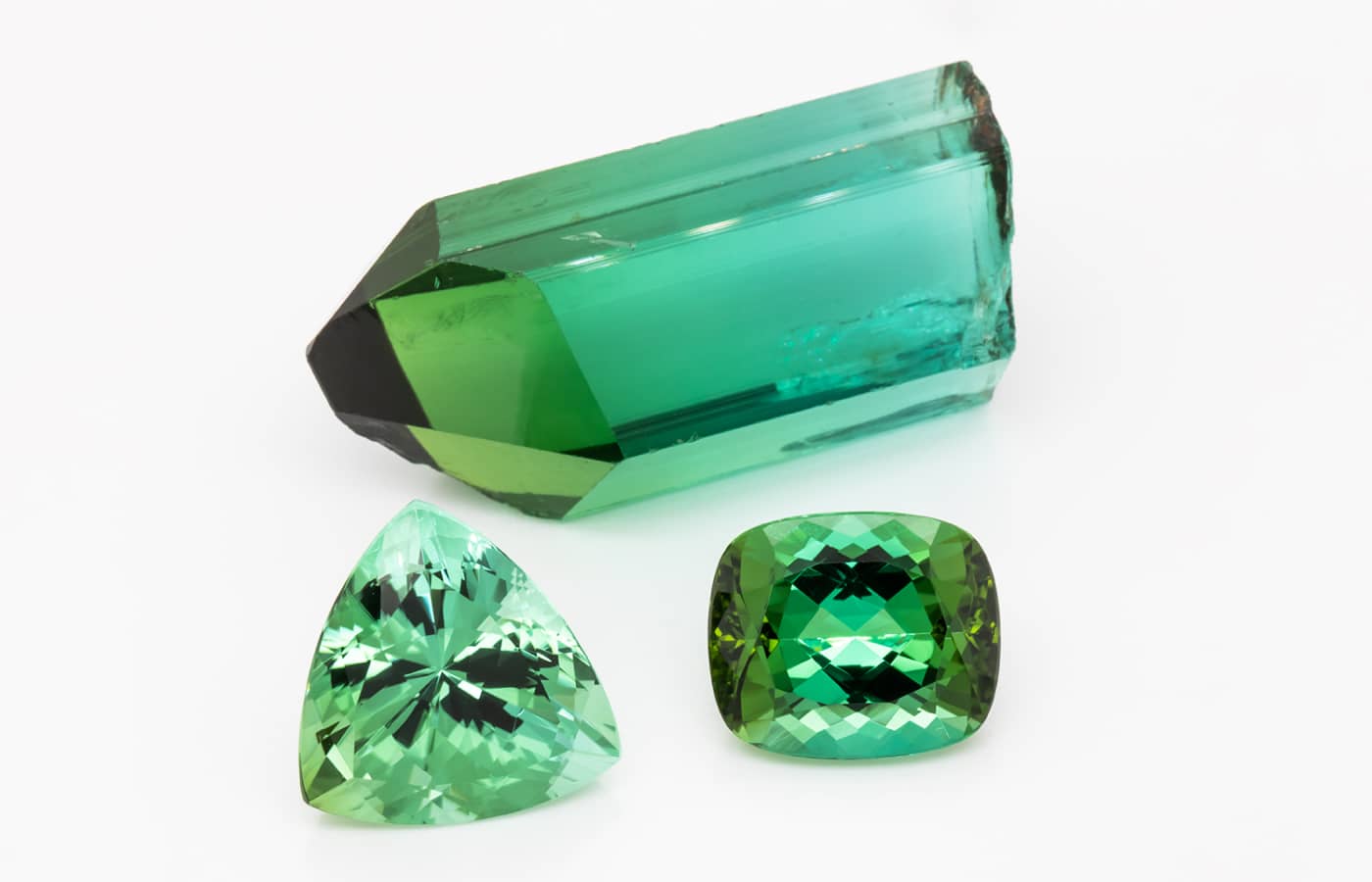  Gemhype 6.61-ct cushion-cut green tourmaline and a 9.18-ct trillion-cut green tourmaline