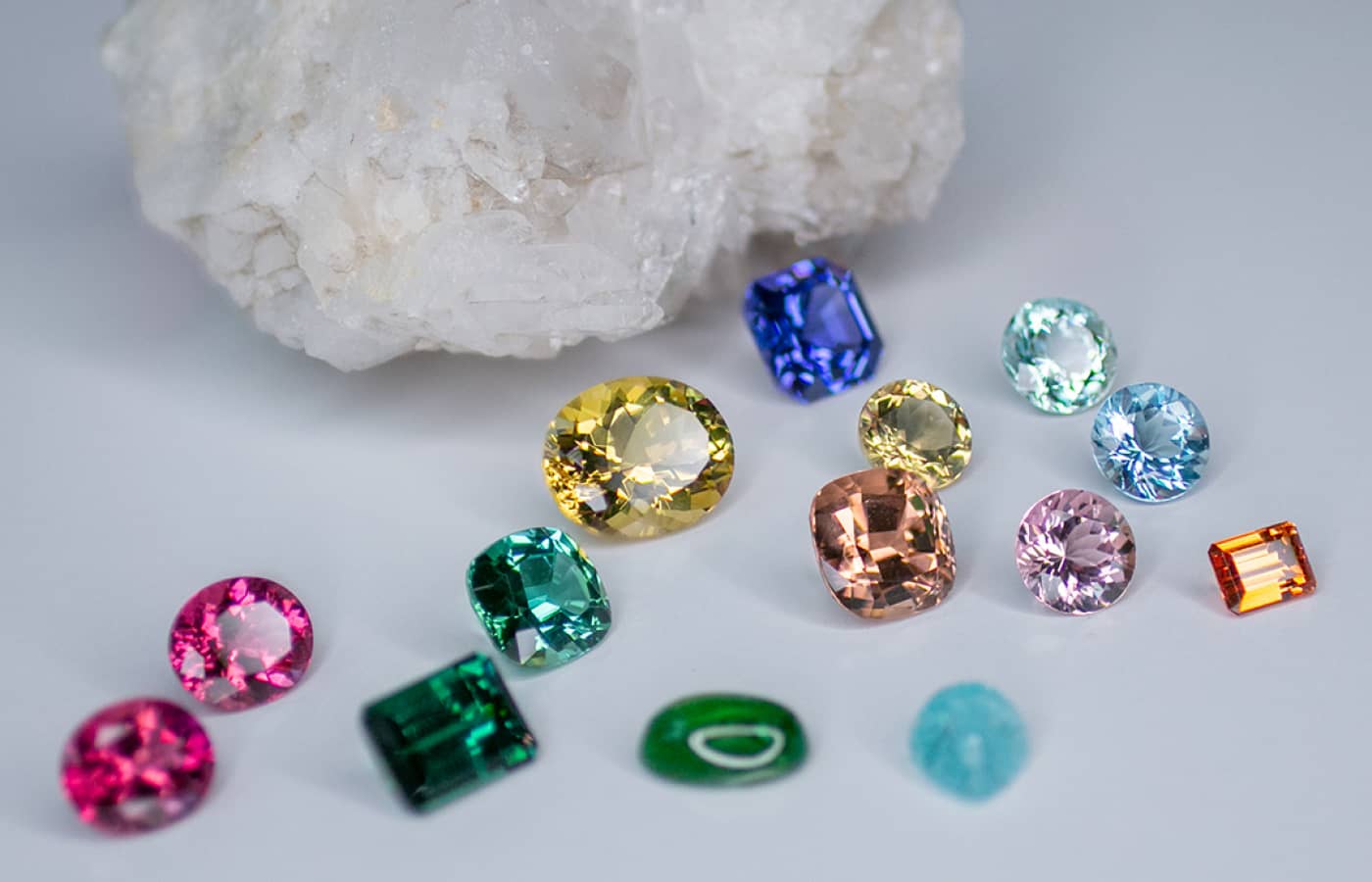  Lifestyle shot of a series of Gemhype coloured gemstones