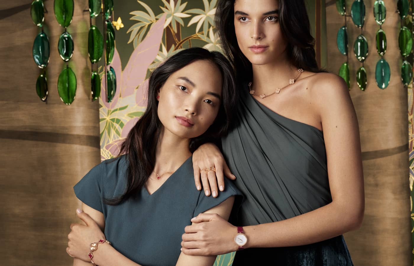 Models wearing Van Cleef & Arpels Sweet Alhambra watch and Perlée watch in gold