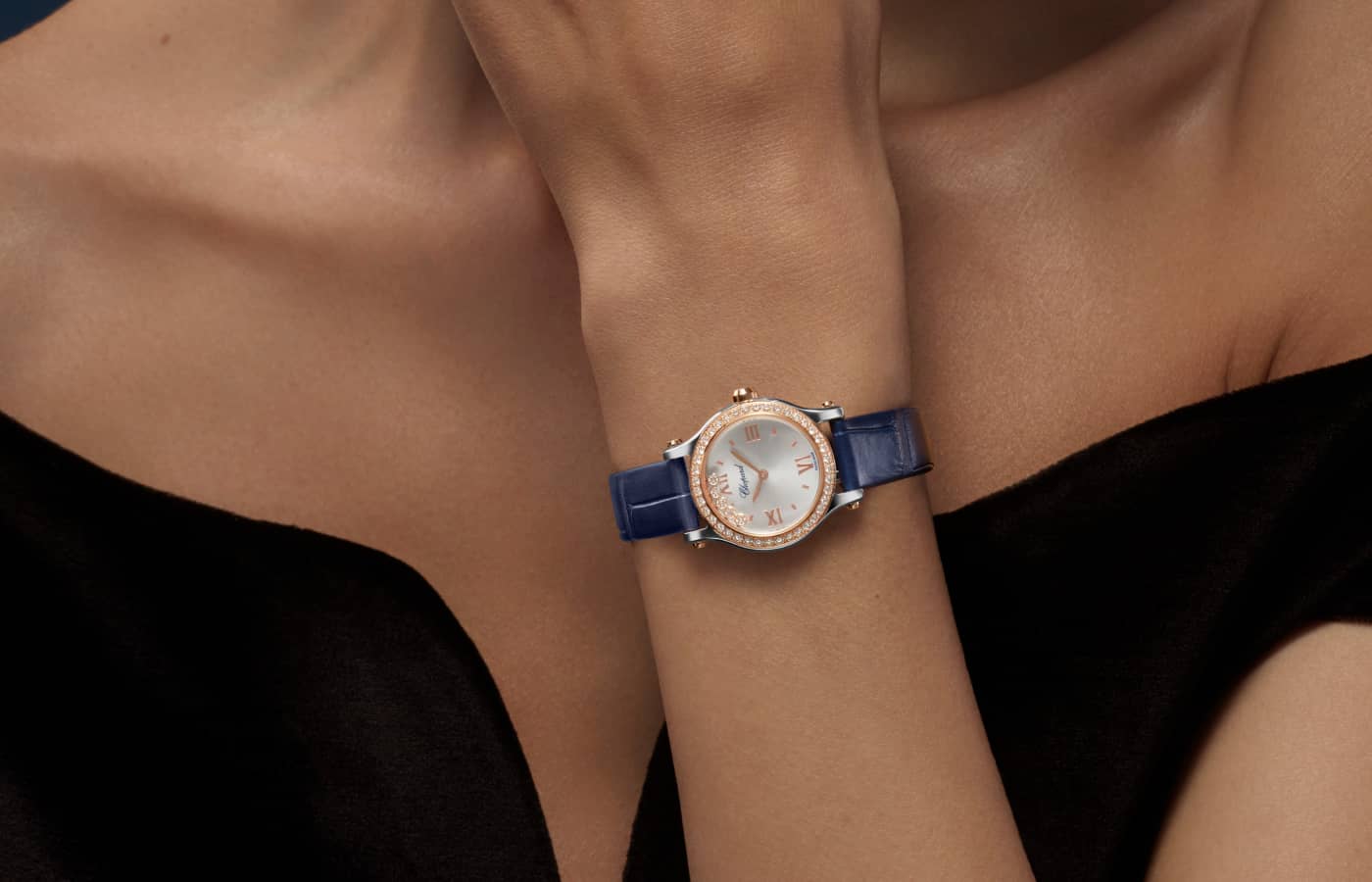  Model wearing Chopard Happy Sports watch in rose gold, Lucent Steel mother of pearl and diamond 
