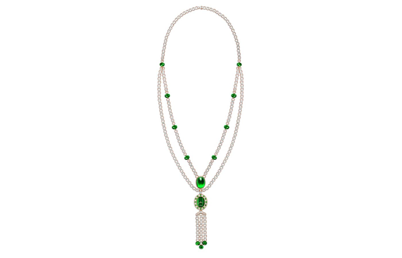 Piaget High Jewellery Sautoir watch in yellow gold featuring a 25.38-ct oval cabochon Zambian emerald