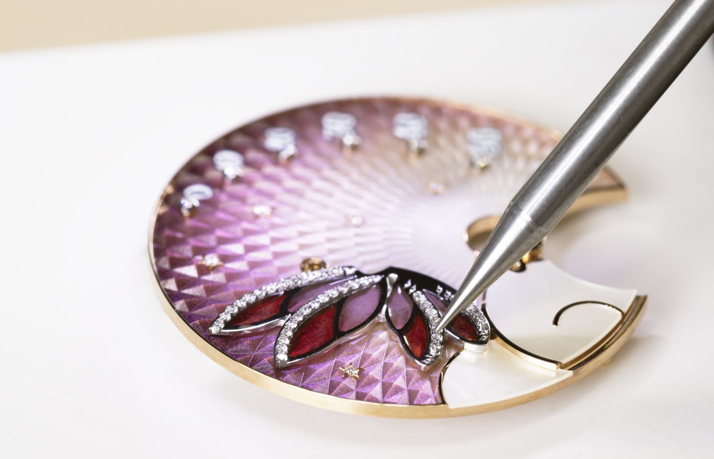  Making of the Van Cleef & Arpels Lady Féerie Or Rose watch  in rose gold,  pink sapphire, white mother-of-pearl, opaque and plique-à-jour enamel and diamond 