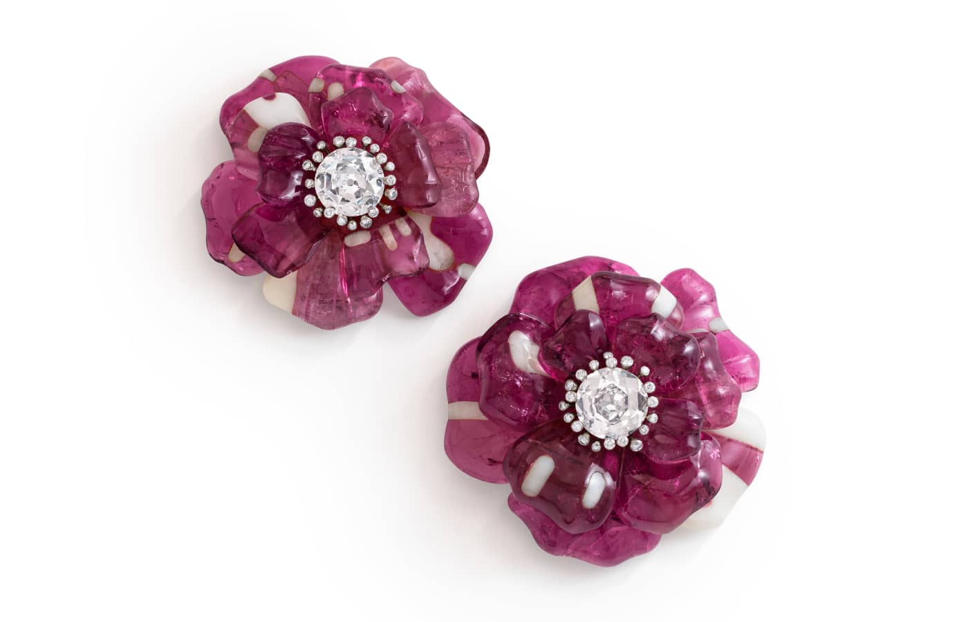 JAR ‘Camelia’ brooches with pink tourmaline and white agate petals, and round diamonds in platinum and 18k white gold, 1985, due to be sold at the Christie’s Magnificent Jewels auction on 17 May 2023