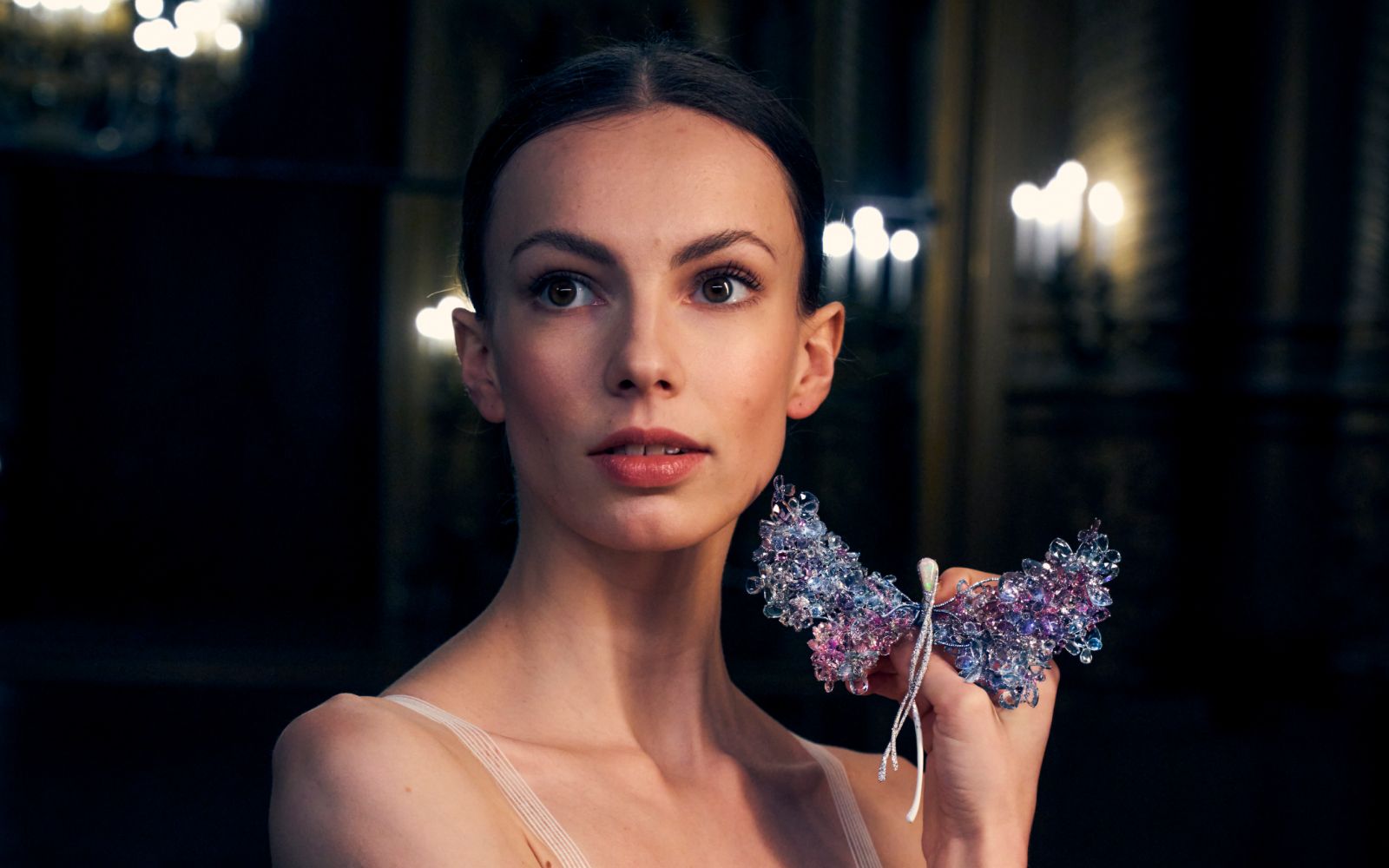 Première Danseuse Bleuenn Battistoni of the Paris Opera Ballet holding the Feng J ‘Blooming Dragonfly Diva’ brooch. Photo credit: James Bort