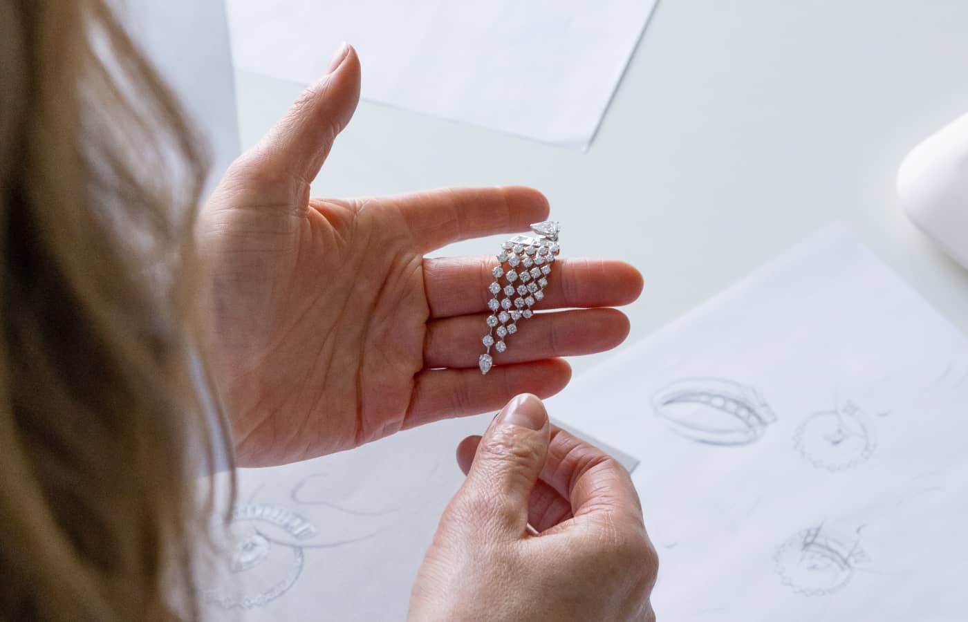  A pair of Inner Fire diamond-set drop earrings by Bucherer Fine Jewellery
