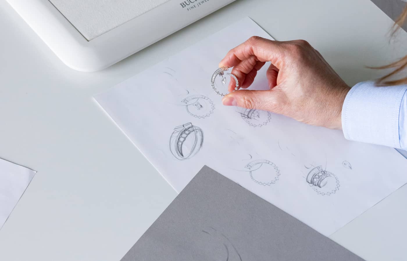 A pair of Bucherer Fine Jewellery Inner Fire earrings in real-life versus an initial sketch by Hollie Bonneville Barden