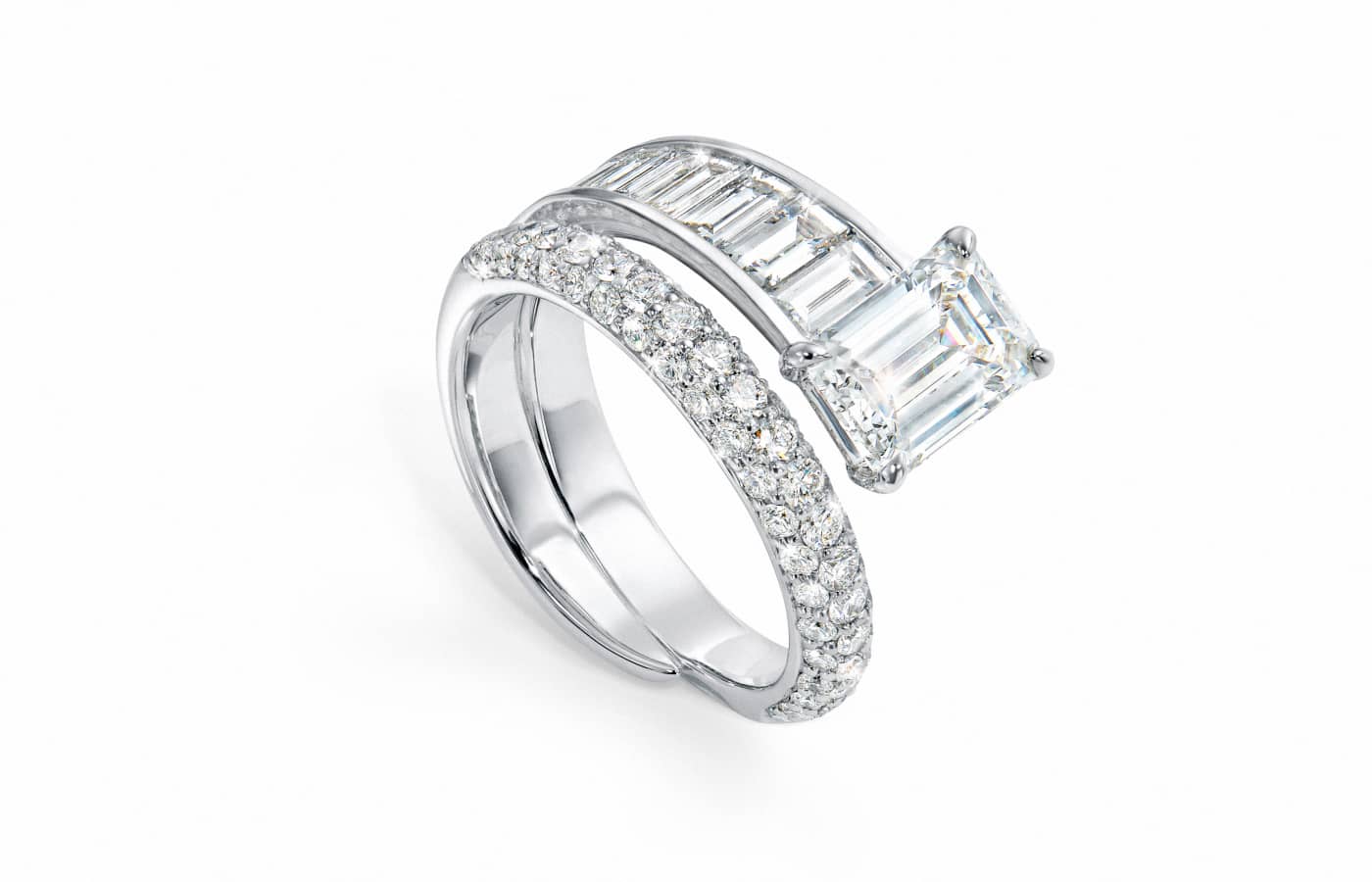 An emerald-, baguette- and round brilliant-cut diamond ring in the Inner Fire High Jewellery capsule collection by Bucherer Fine Jewellery