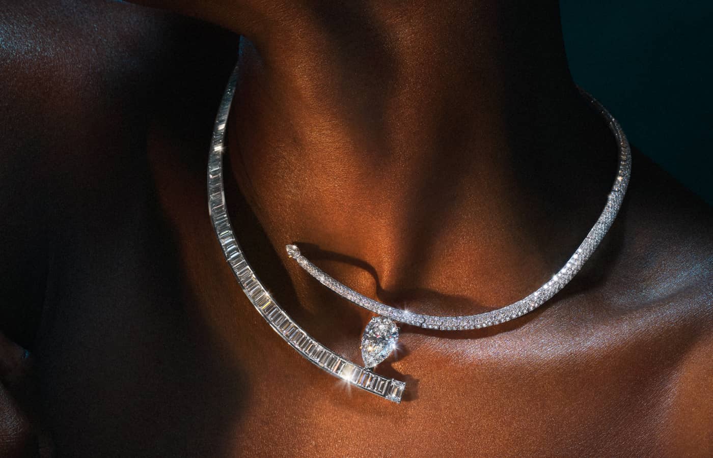  A signature necklace in the Inner Fire High Jewellery capsule collection by Bucherer Fine Jewellery with a pear-shaped diamond accent, round brilliant- and baguette-cut diamonds in white gold