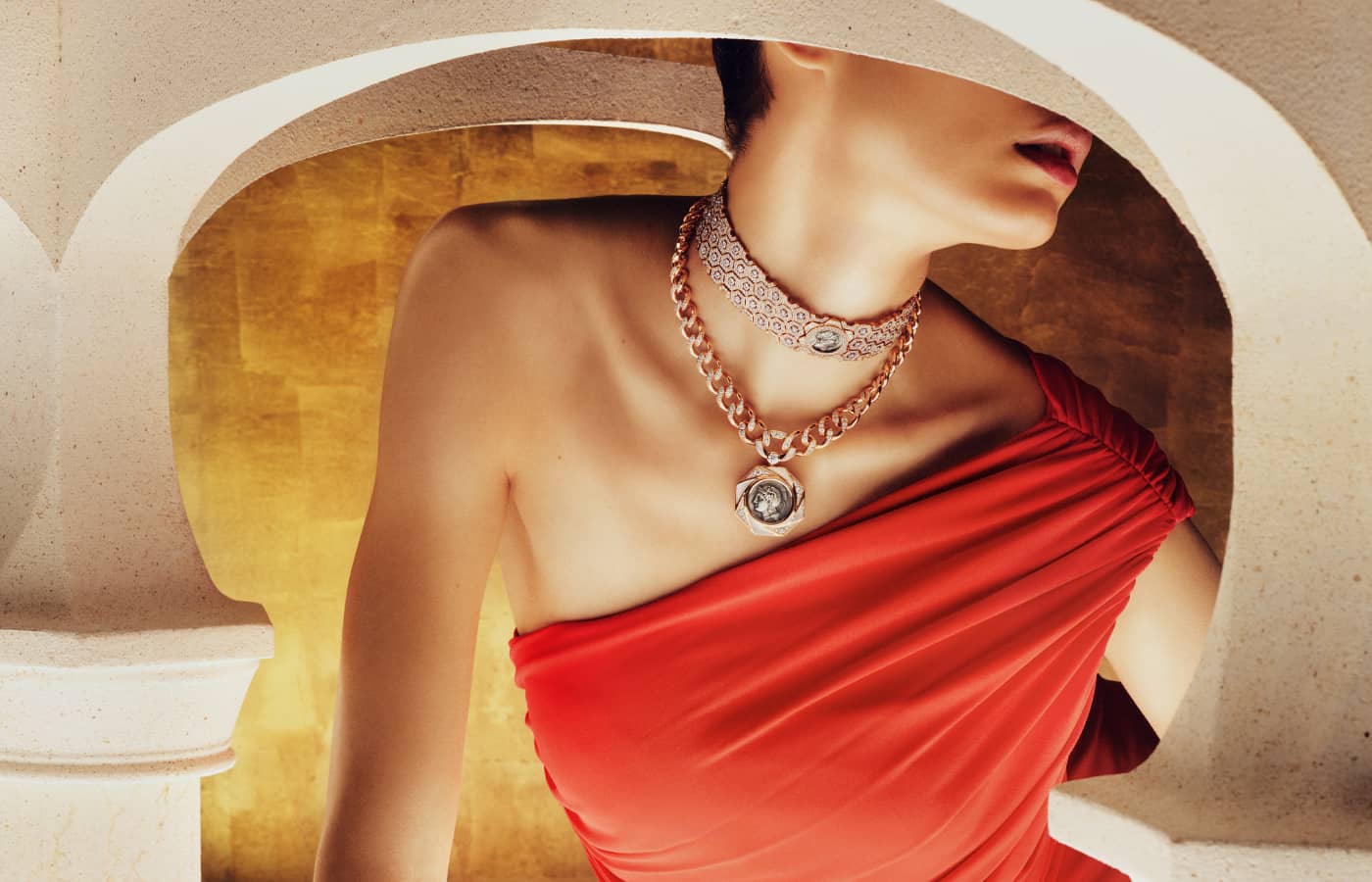 A model wears Roman Splendor necklaces from the Bulgari Mediterranea High Jewellery Collection
