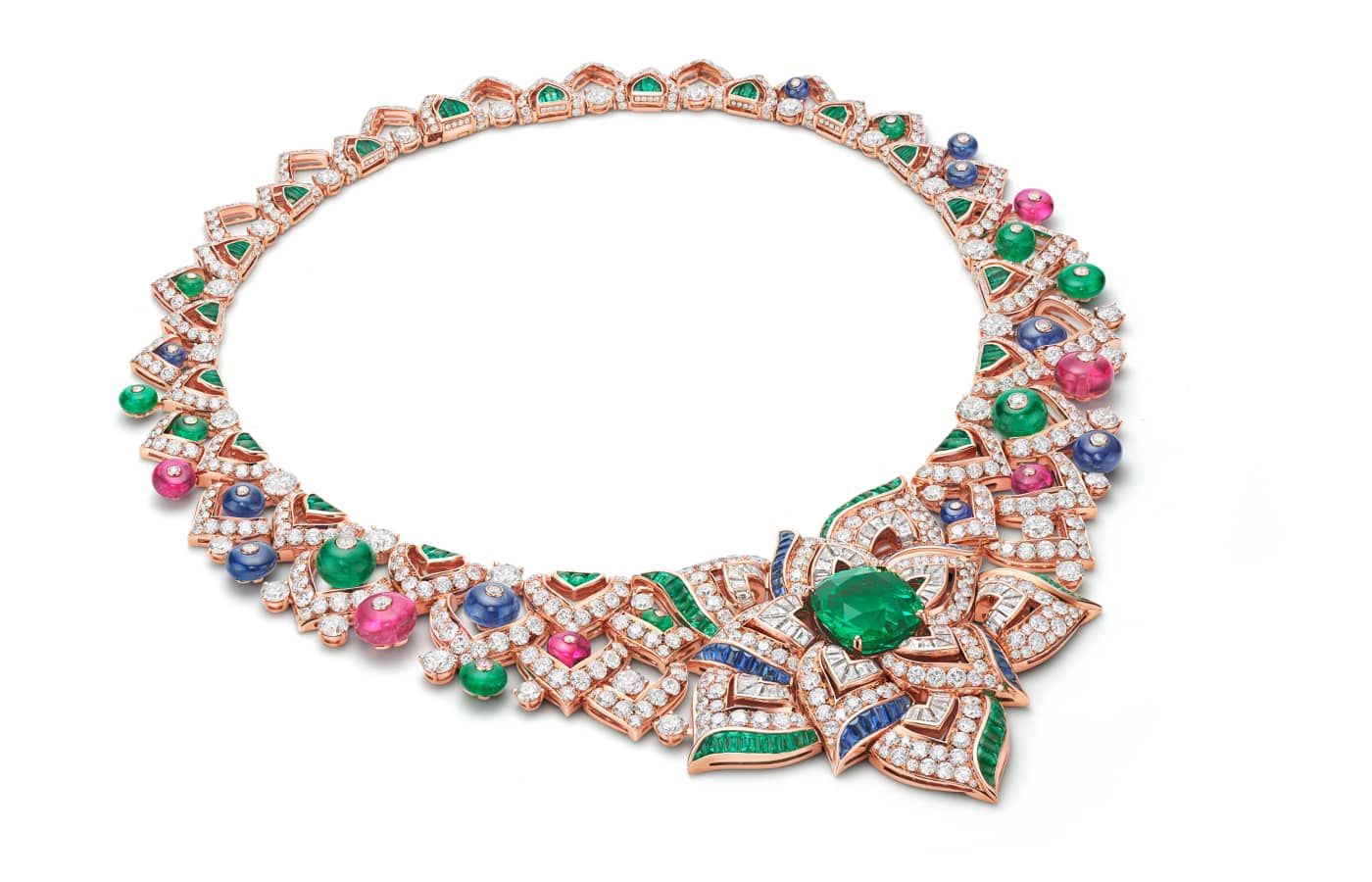 The Oriental Buds necklace with a 13.34 carat antique cushion-cut emerald from Colombia, surrounded by Byzantine-inspired patterns of diamonds, pink tourmalines, sapphire and emerald beads from the East Meets West chapter of the Bulgari Mediterranea High Jewellery Collection