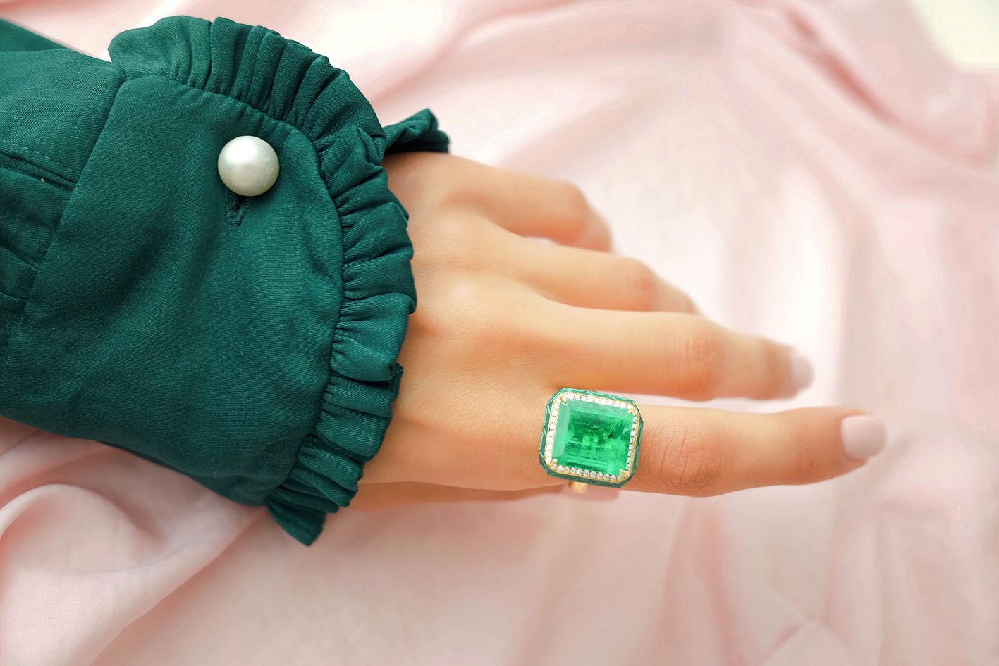 Model wearing Sarah Ho emerald and diamond ring 