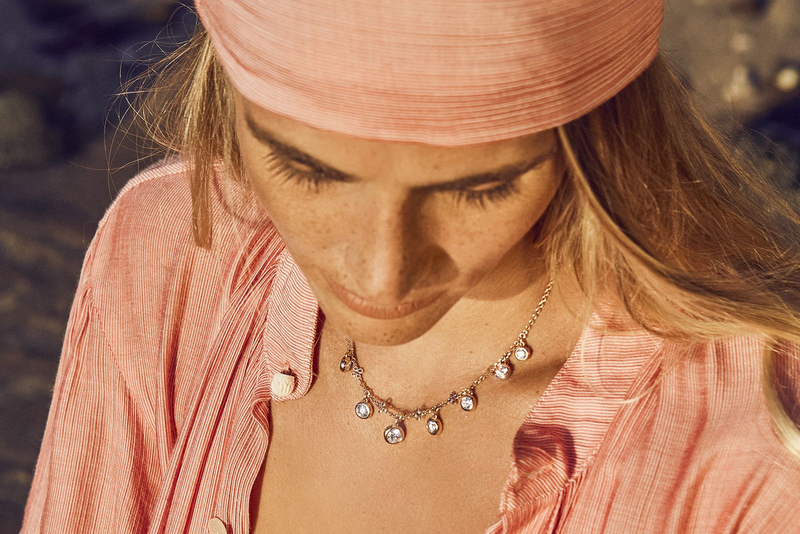 Model wearing Boodles gold and diamond necklace 