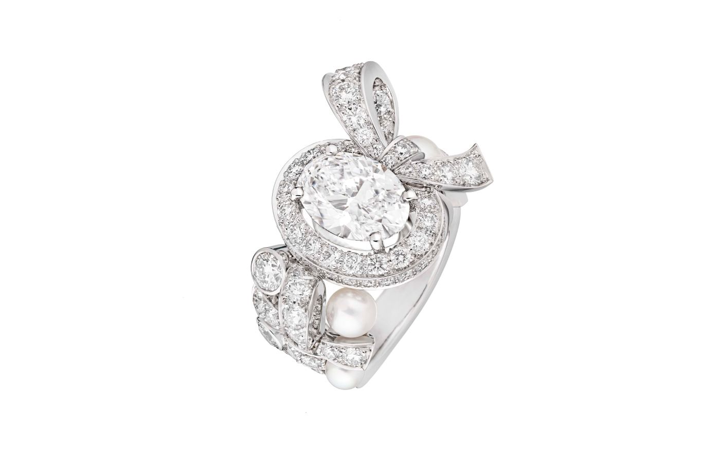 Chanel Tweed Pastel ring with an oval-cut diamond of 3.04-carats (internally flawless, D-colour, Type IIa) plus further diamonds and cultured pearls in white gold, from the Tweed Ruban set of the Tweed de Chanel High Jewellery Collection