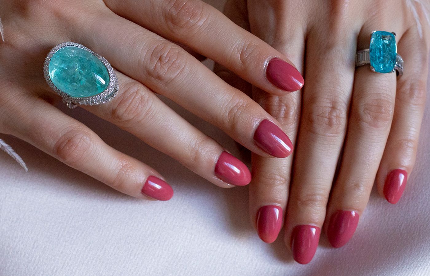  Katerina Perez wearing a pair of Parure Atelier High Jewellery rings featuring a 39.34-ct cabochon Paraiba tourmaline and a 7.82-ct Paraiba tourmaline 