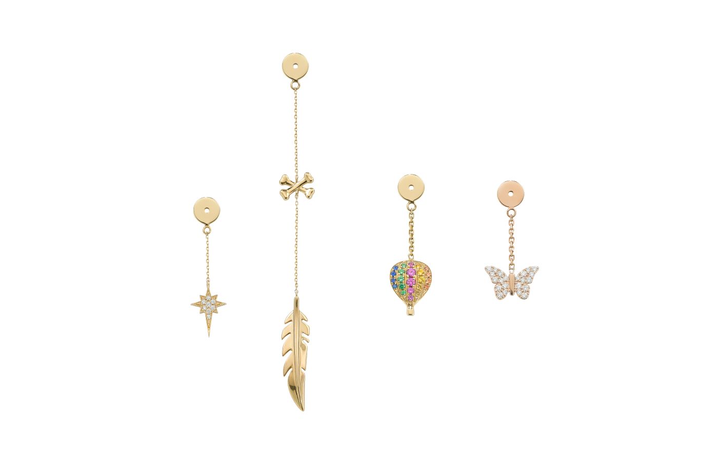  A selection of Robinson Pelham WishBacks, including a long Feather and Crossbones in 14k yellow gold