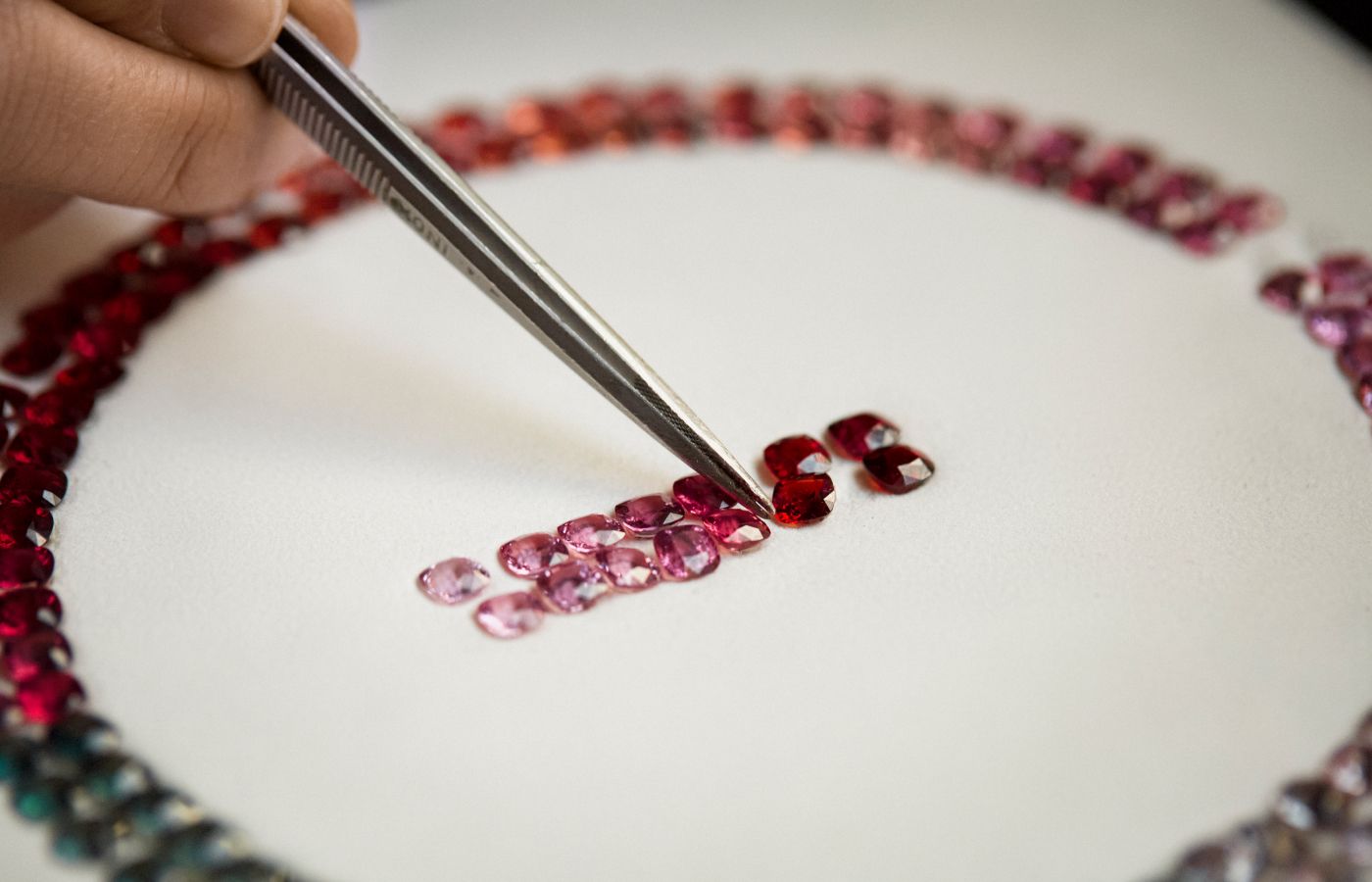 Colour matching the spinels set in the Pomellato Skyline necklace  from the Ode to Milan High Jewellery collection