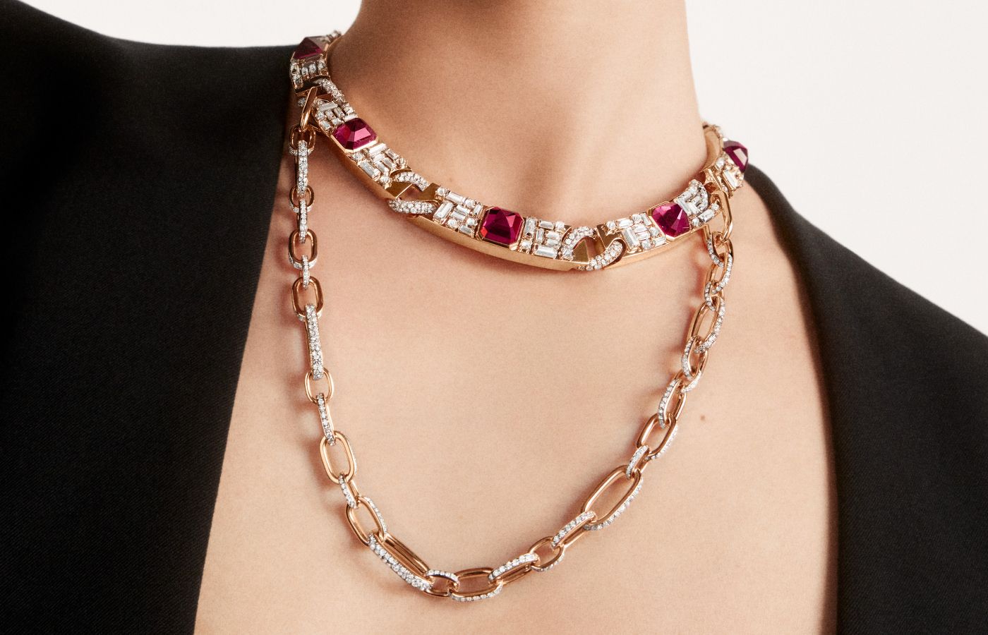  Model wearing the Pomellato Castello necklace in rose and white gold, rubellites and diamonds from the Ode to Milan High Jewellery collection