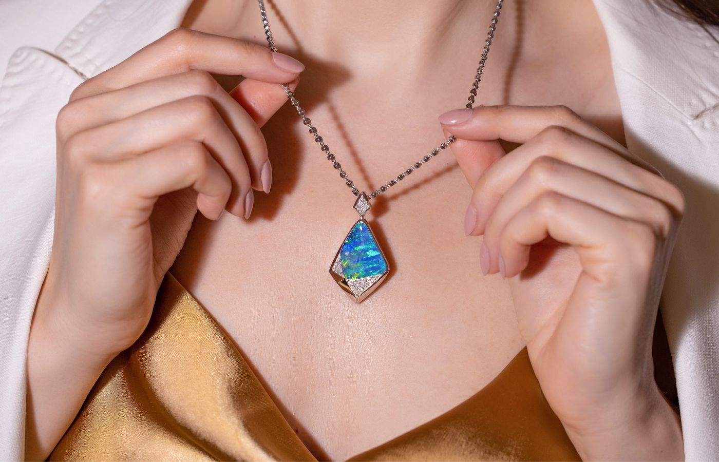  A closer look at an Australian opal and diamond pendant necklace by designer Cindy Xu