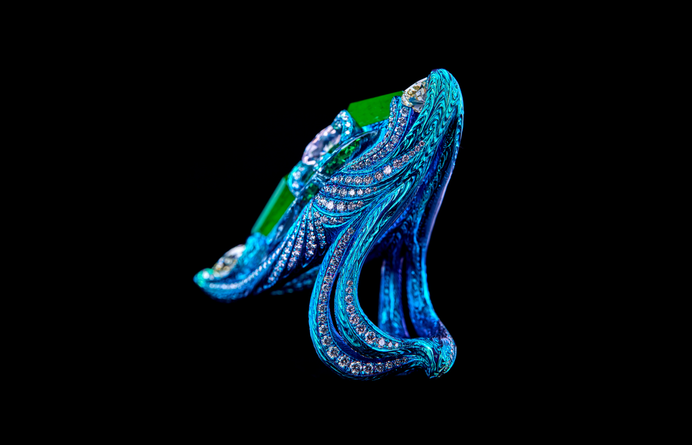  The Variations on Light ring by Wallace Chan features a carved ban with a swirling pattern to symbolise eternity, humility, power, wisdom and grace