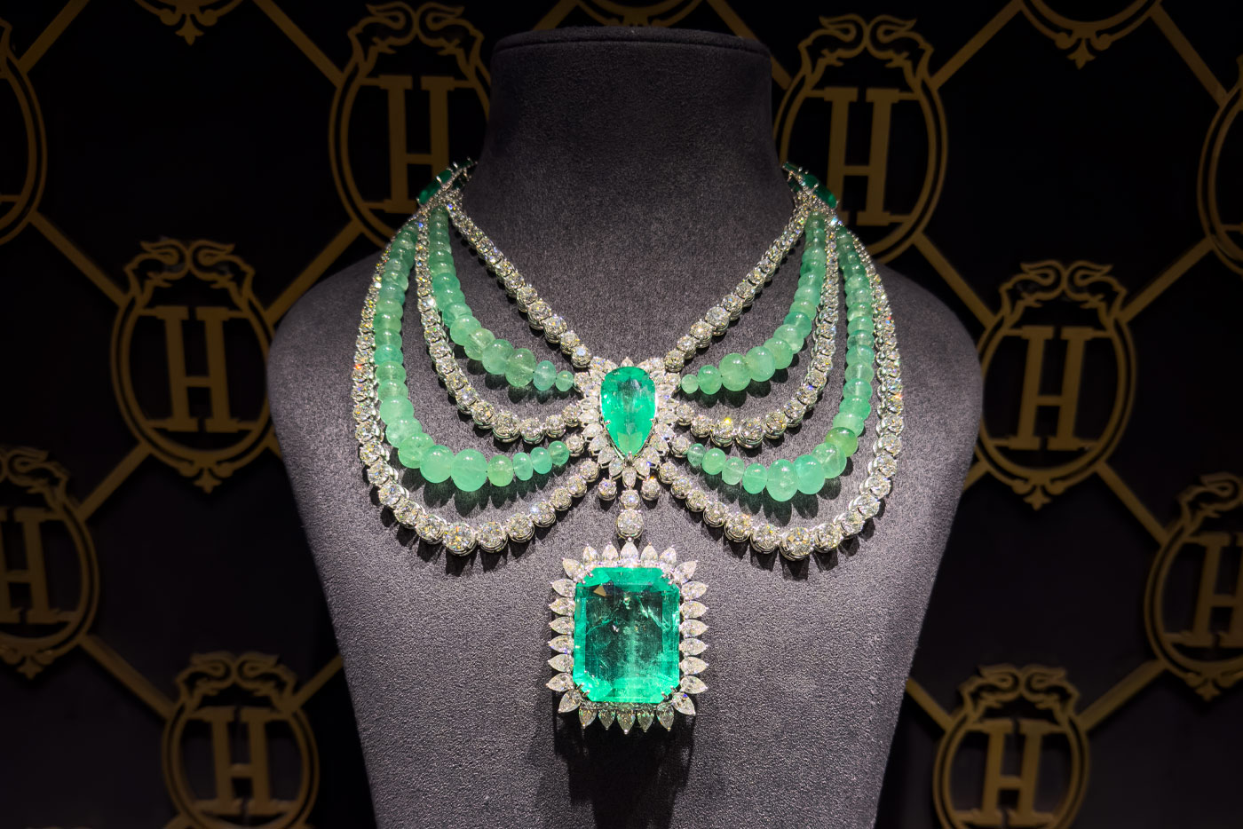 A mesmerizing 102-carat Colombian emerald steals the spotlight at the heart of this exquisite necklace by Hazoorilal Legacy