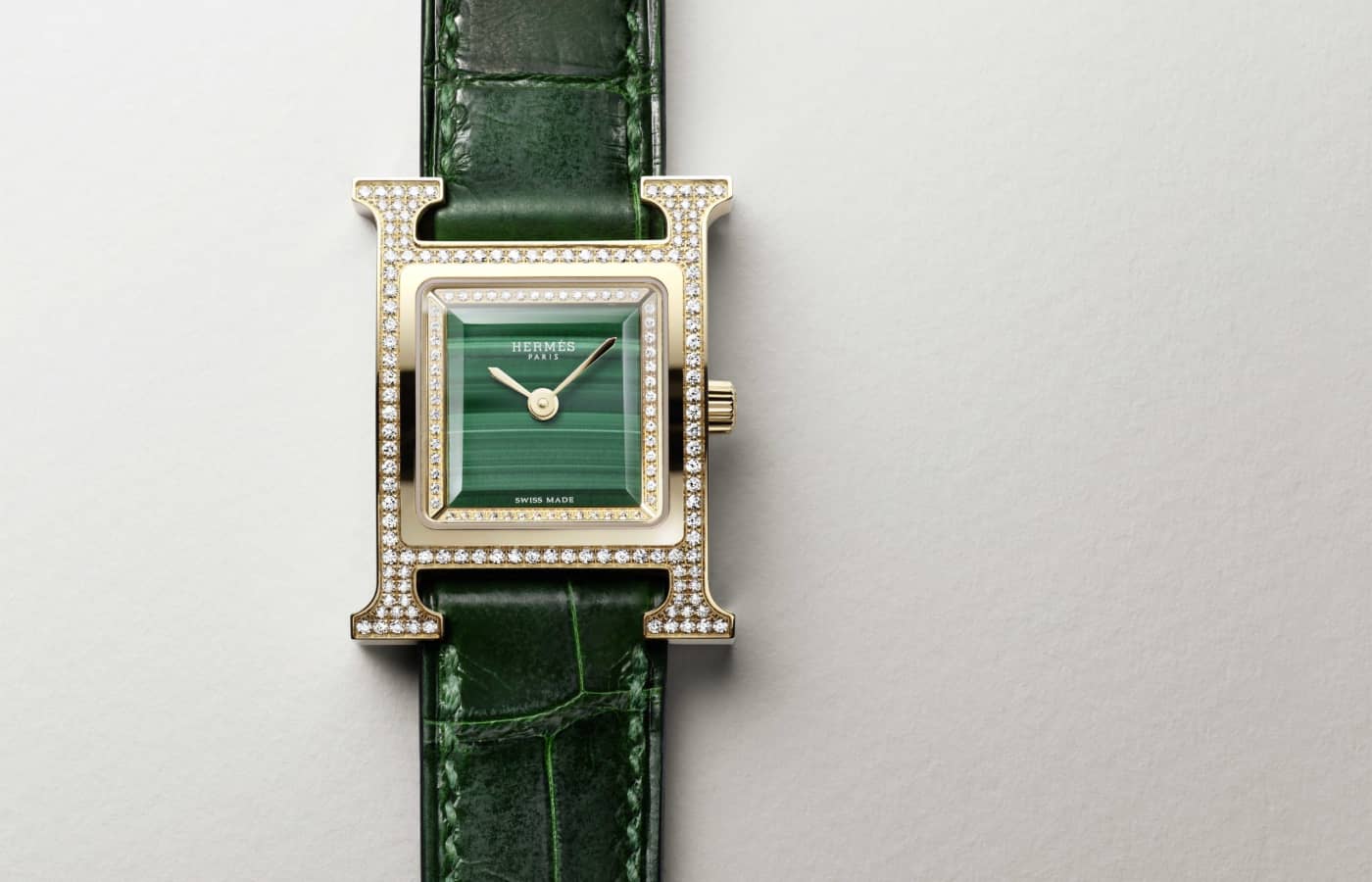  Hermès Heure H watch with a malachite dial and diamond-set rose gold case