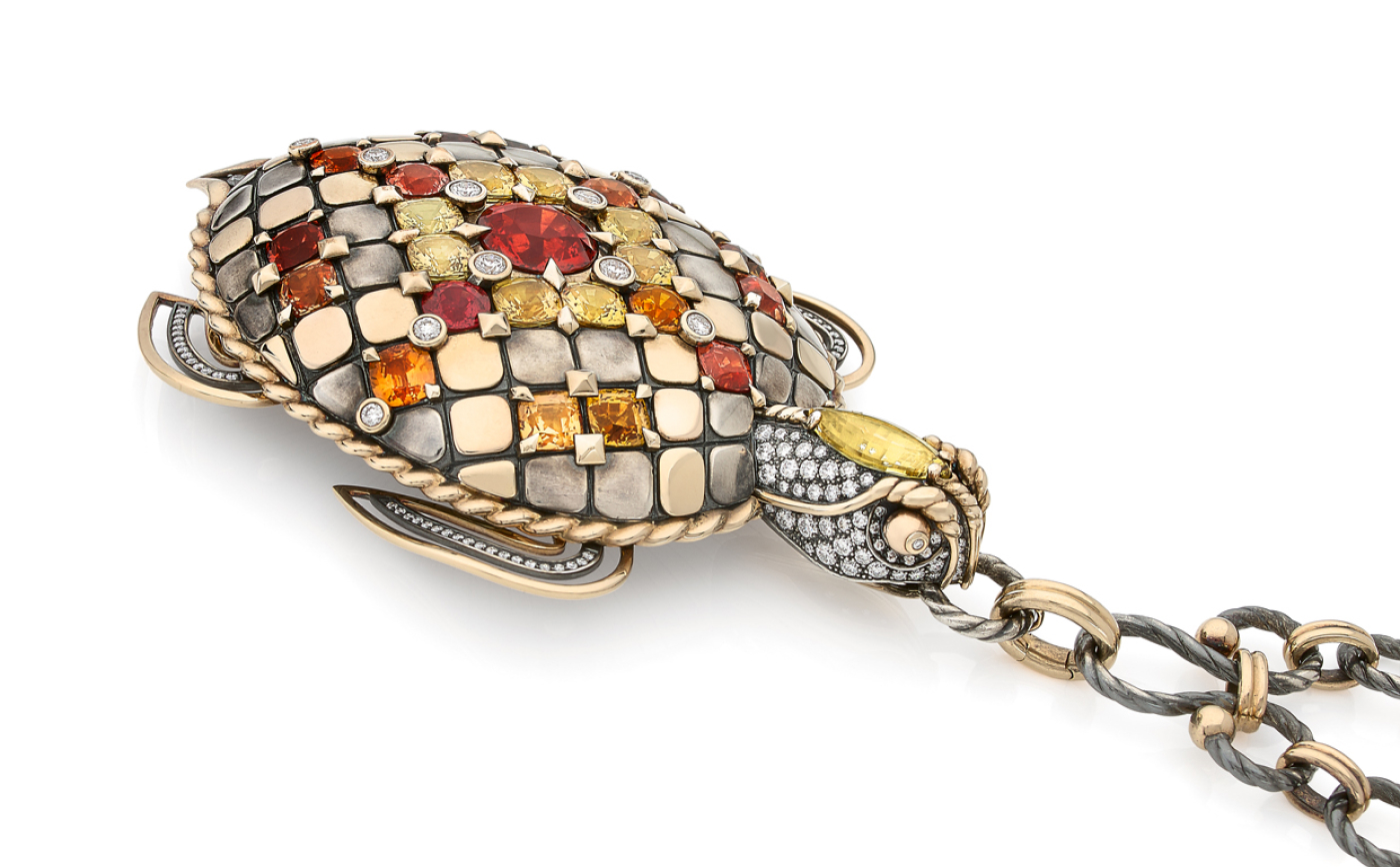  Turtle pendant with sapphires, beryls and a cushion cut spessartine garnet  by Elie Top