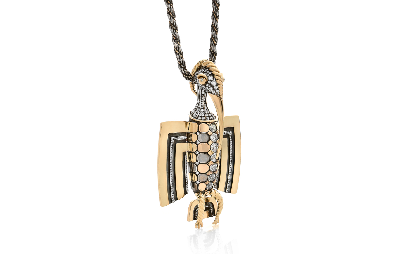 Hornbill pendant with diamonds in yellow gold and silver from Magica Naturae collection by Elie Top