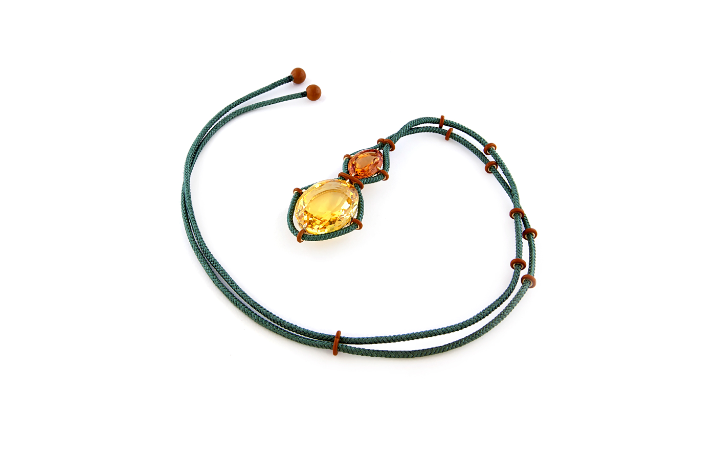 <p>Taffin necklace in gold, ceraminc, featuring a 129.08-ct yellow sapphire and a 21.98-ct topaz</p>
