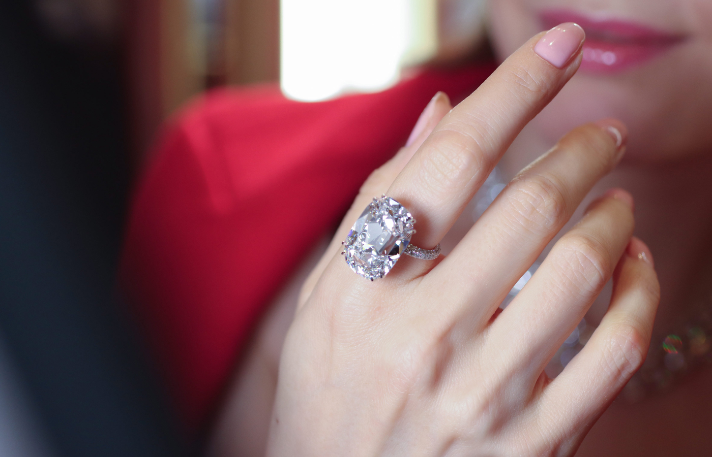 Katerina Perez wears a 20.92 carat D colour internally flawless antique cushion-cut diamond ring by Ronald Abram