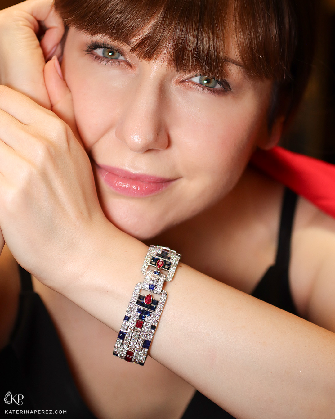 Katerina Perez wearing Ronald Abram art deco bracelet with rubies, sapphires and diamonds