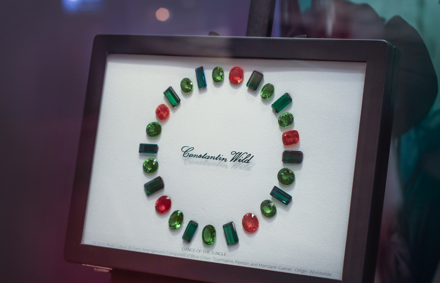  'The Dance of the Jungle' suite featuring tourmaline, peridot and mandarin garnet, presented by Constantin Wild in Hong Kong
