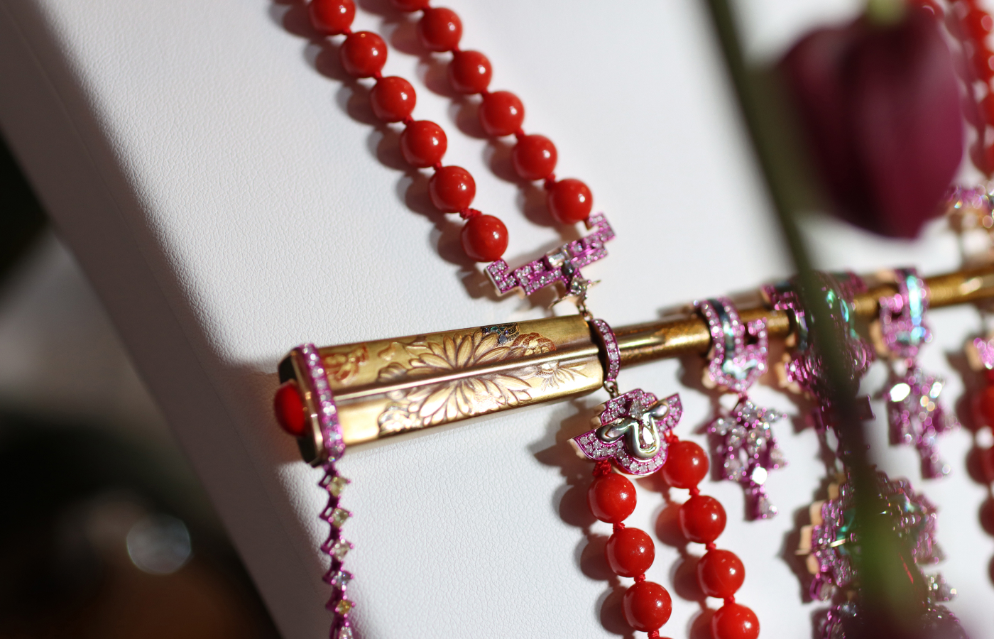  Austy Lee ‘The Akai Amorōnagu Necklace’ in 18K rose gold with Mozambican unheated pigeon-blood rubies, Momo red coral, antique Meiji maki-e lacquered hairpin, red and black enamel, and diamonds 