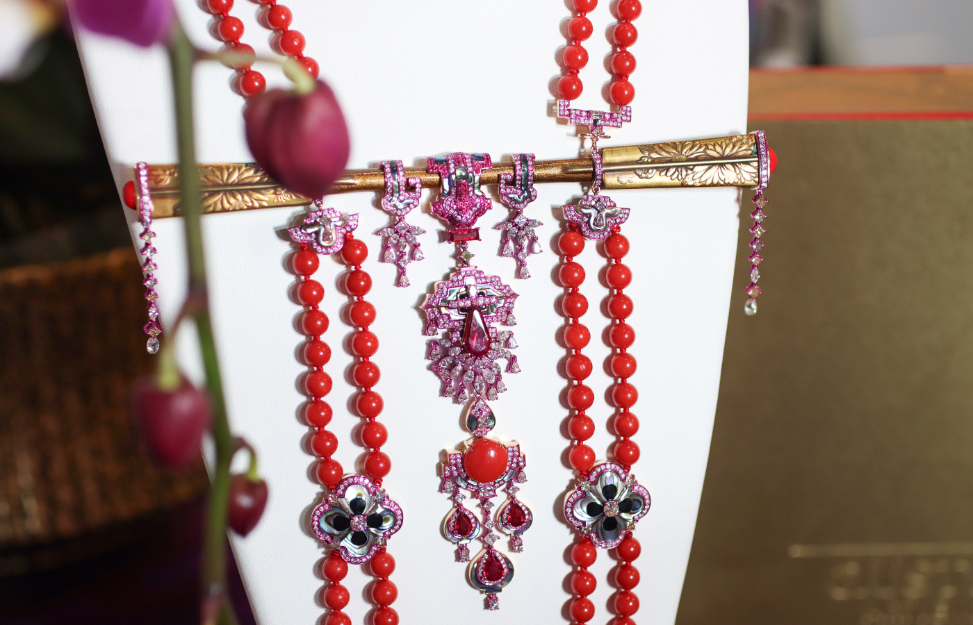 Austy Lee ‘The Akai Amorōnagu Necklace’ in 18K rose gold with Mozambican unheated pigeon-blood rubies, Momo red coral, antique Meiji maki-e lacquered hairpin, red and black enamel, and diamonds 