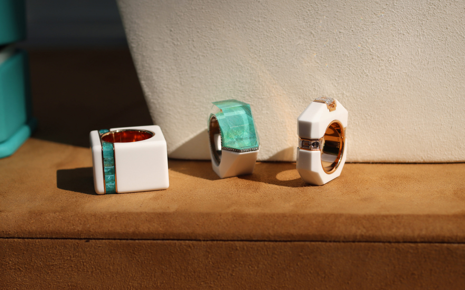 A trio of rings by Inés Nieto in white cacholong, rose gold and oxidised copper with diamonds, rock crystal and Paraiba tourmaline