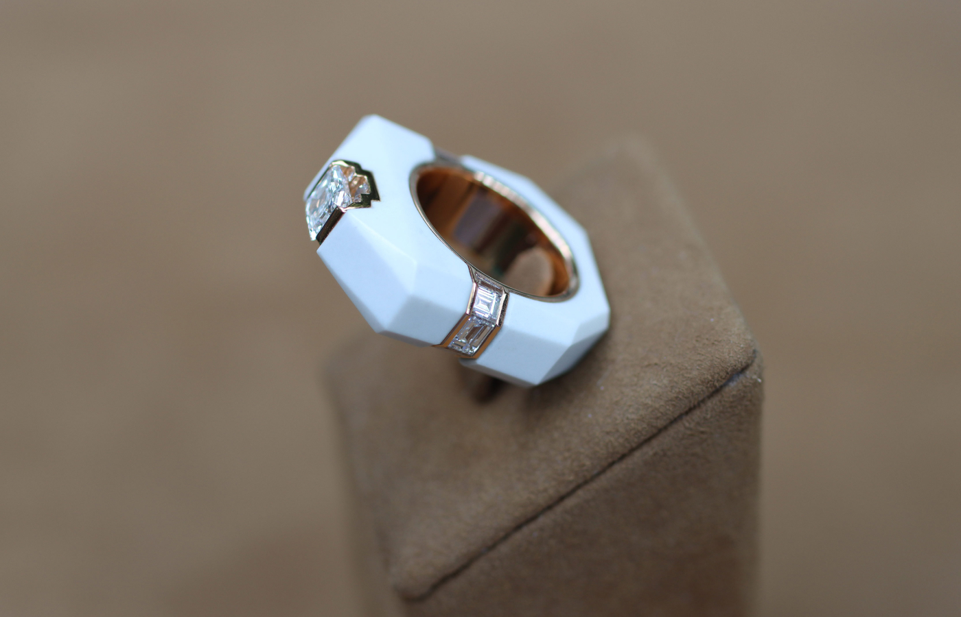   Inés Nieto ring with a D-colour Asscher-cut diamond centre stone, carre-cut diamond side stones and white cacholong with 18k rose gold