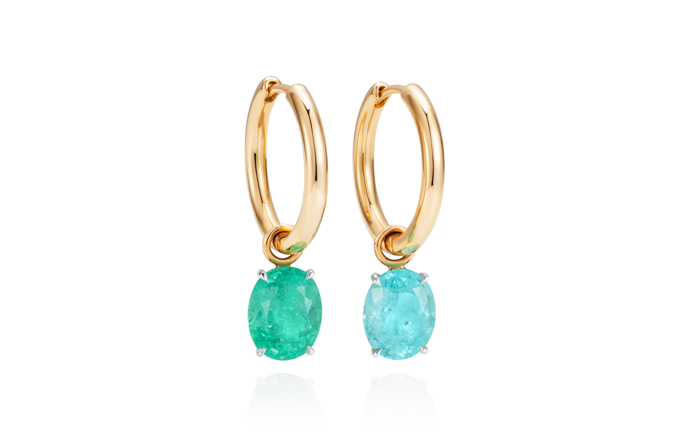  Inés Nieto ‘toi et moi’ style hoops with 5.50 carats of oval-shaped Paraiba drops, one in green and one in blue