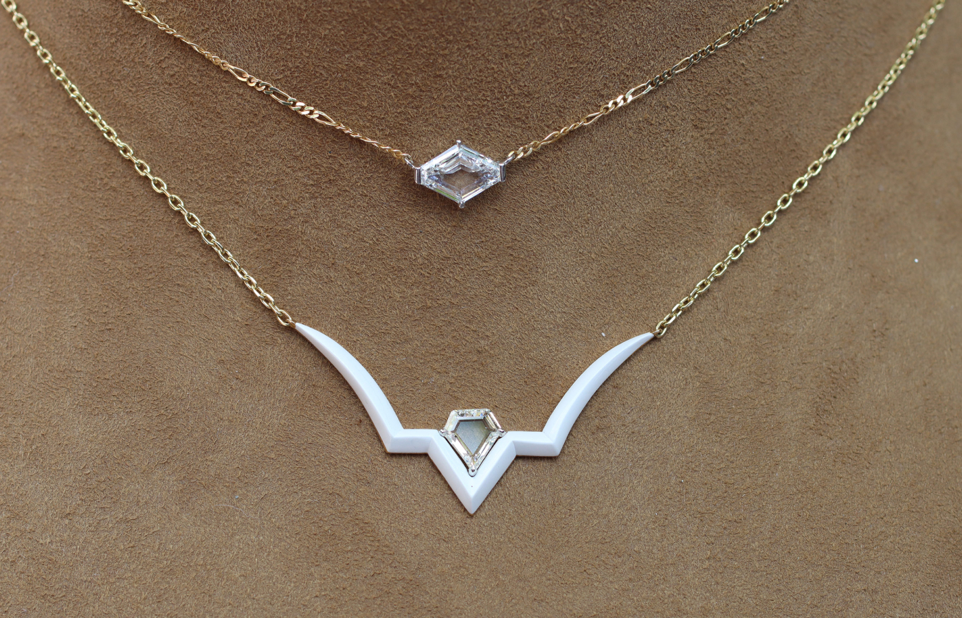  Inés Nieto Taura necklace with white cacholong and a portrait-cut diamond, paired with a portrait-cut diamond solitaire necklace