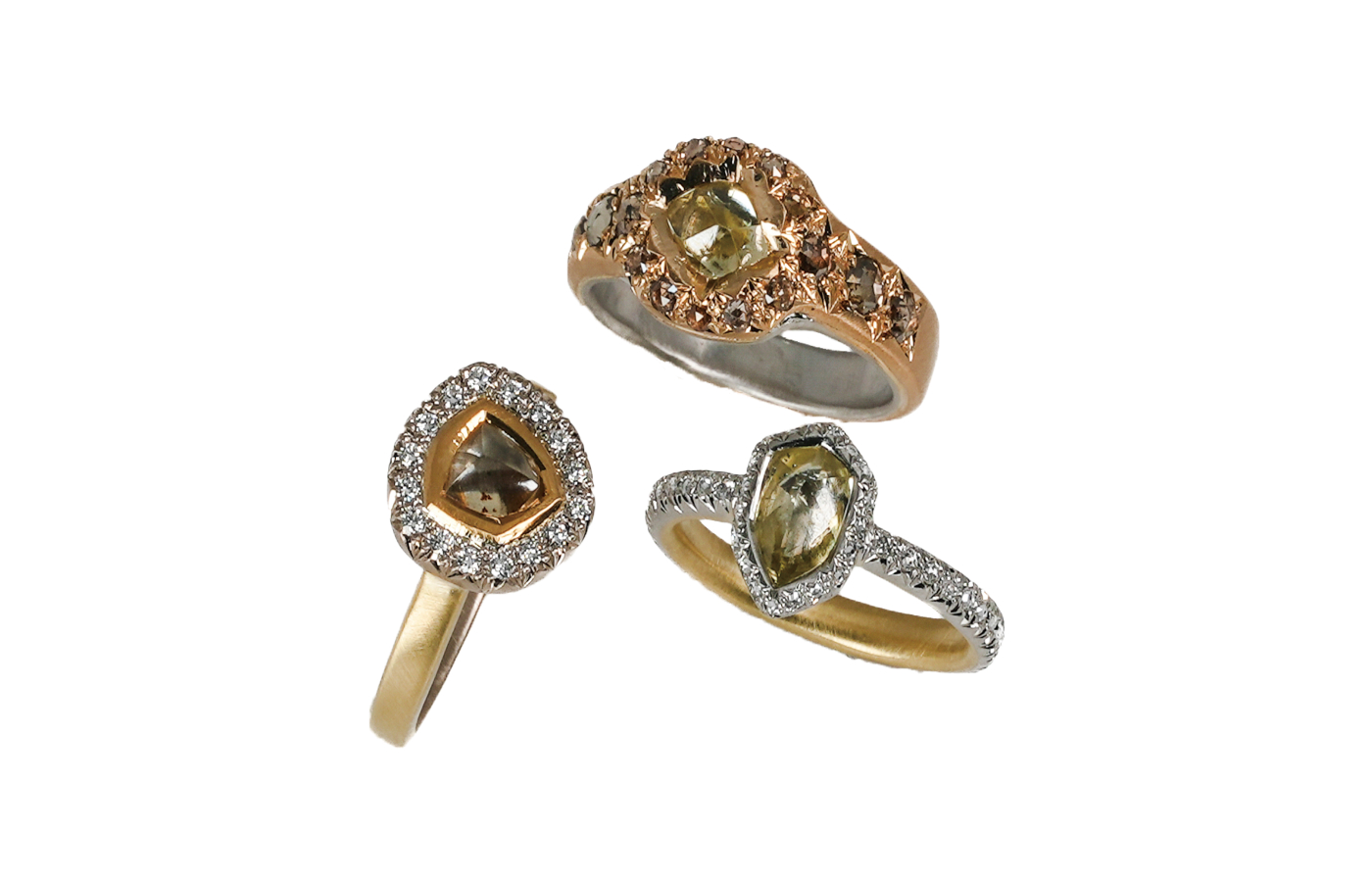 Hum rings in gold and white and coloured diamonds