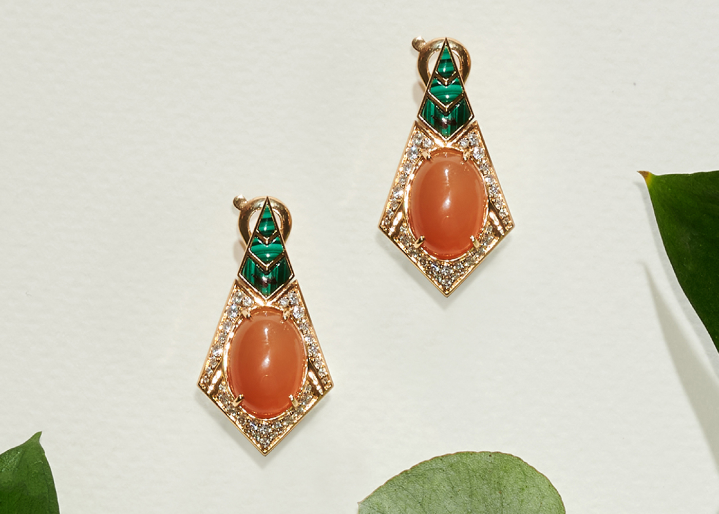 Al Zain Zara earrings with two moonstone cabochons for a total of 14.10 carats, 1.80 carats of malachite and diamonds in 18k yellow gold from the Jena High Jewellery collection