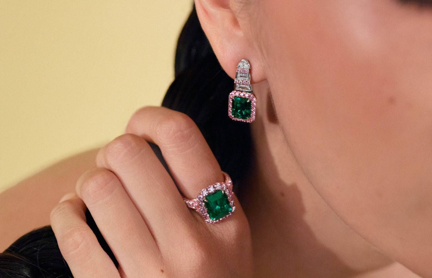 Model wearing Muzo Emerald Colombia Catalina earrings and Diana ring in gold, platinum, Muzo Emeralds, Argyle pink diamonds and white diamonds from the Green Jewel Tradition collection