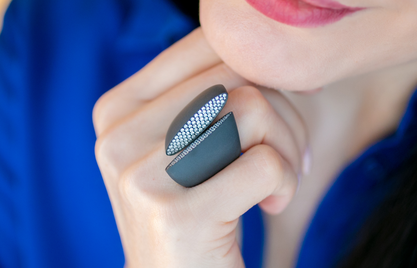 Katerina Perez wears a black titanium and diamond ring by Vhernier 