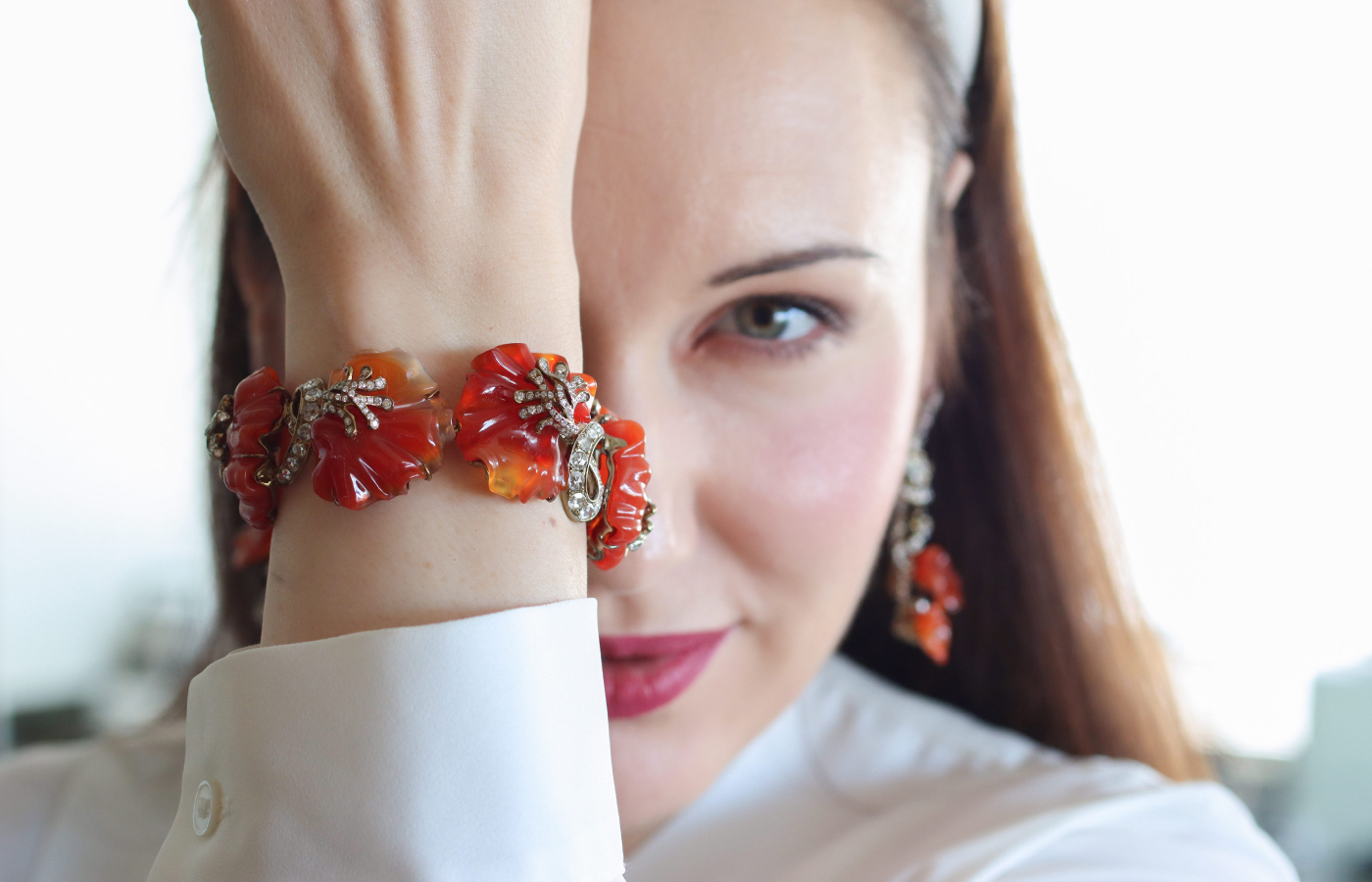 Katerina Perez wears a carved agate and diamond bracelet by Neha Dani 