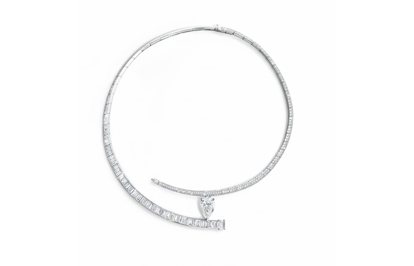  Inner Fire High Jewellery necklace by Bucherer Fine Jewellery with a pear-shaped diamond and two curved lines of round brilliant- and baguette-cut diamonds in white gold