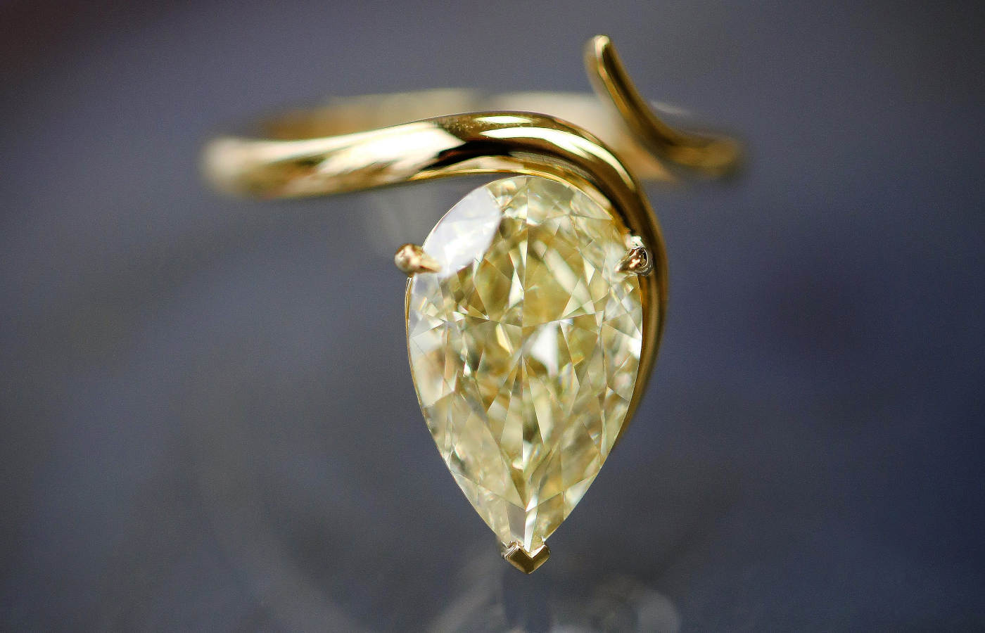 A pear-shaped yellow diamond in 18k yellow gold for a bespoke commission by IceRock Diamonds