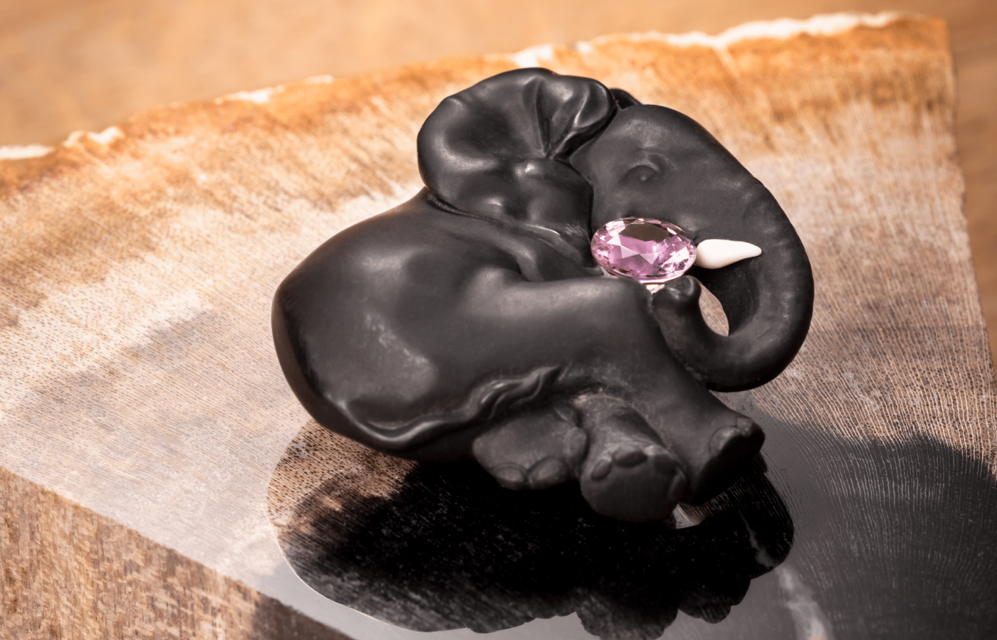  Cartier Beautés du Monde Elephant brooch in petrified magnolia wood, pink sapphire and briolette diamond from the Beautés du Monde  High Jewellery collection