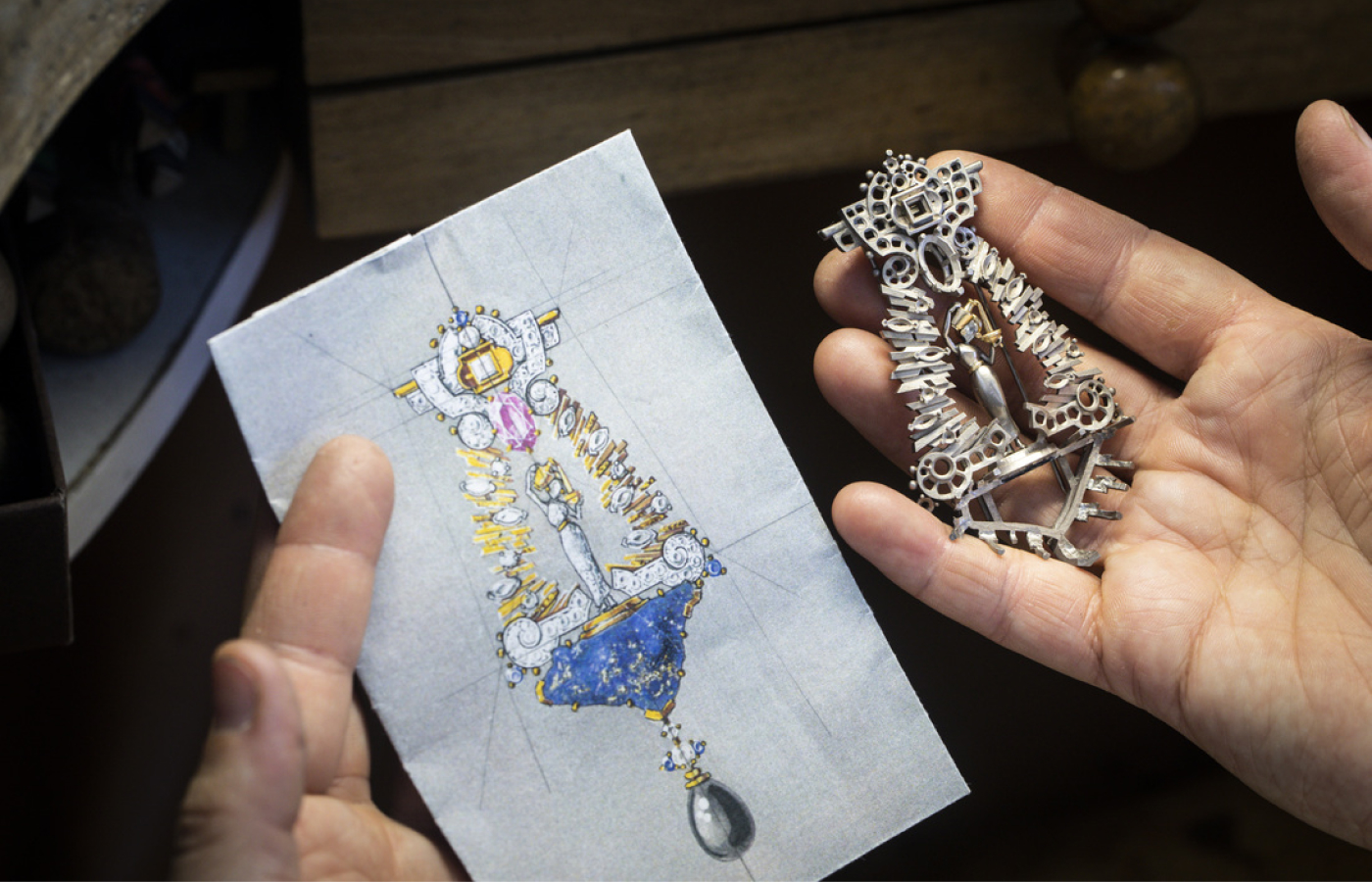Designing and crafting the Van Cleef & Arpels Dea Eterna clip in gold, white gold, rose gold, featuring a 3.47-ct oval-cut pink sapphire, blue sapphires, lapis lazuli, gray cultured pearl and diamonds from Le Grand Tour High Jewellery Collection