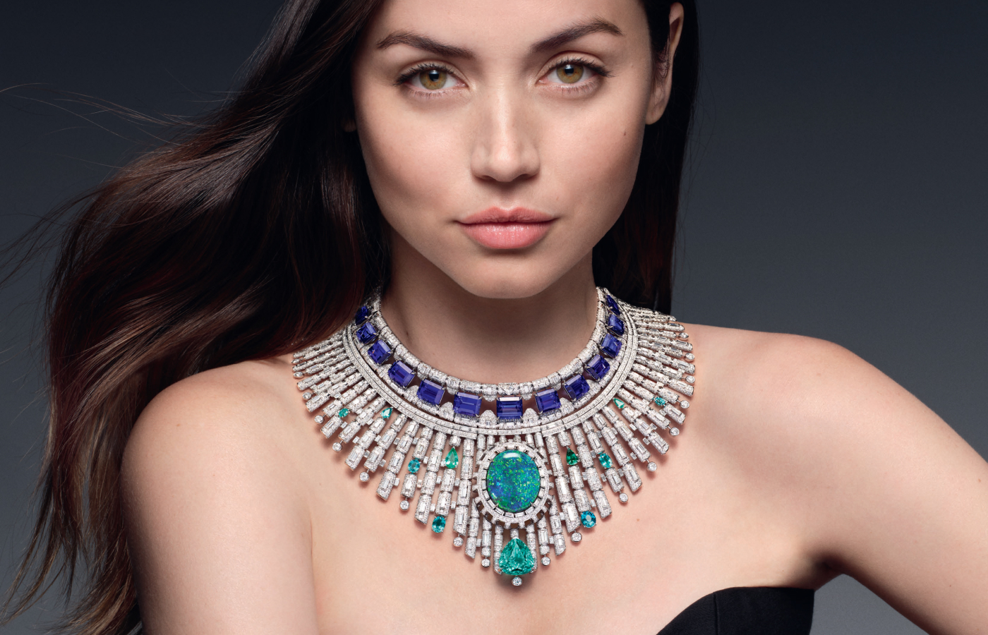  Actress Ana de Armas wearing Louis Vuitton Bones High Jewellery transformable necklace in white gold, platinum, a 43.58-ct oval-cut opal, a 20.9-ct pear-cut Paraiba tourmaline, tanzanites, tourmalines and diamonds from the Deep Time High Jewellery Collection