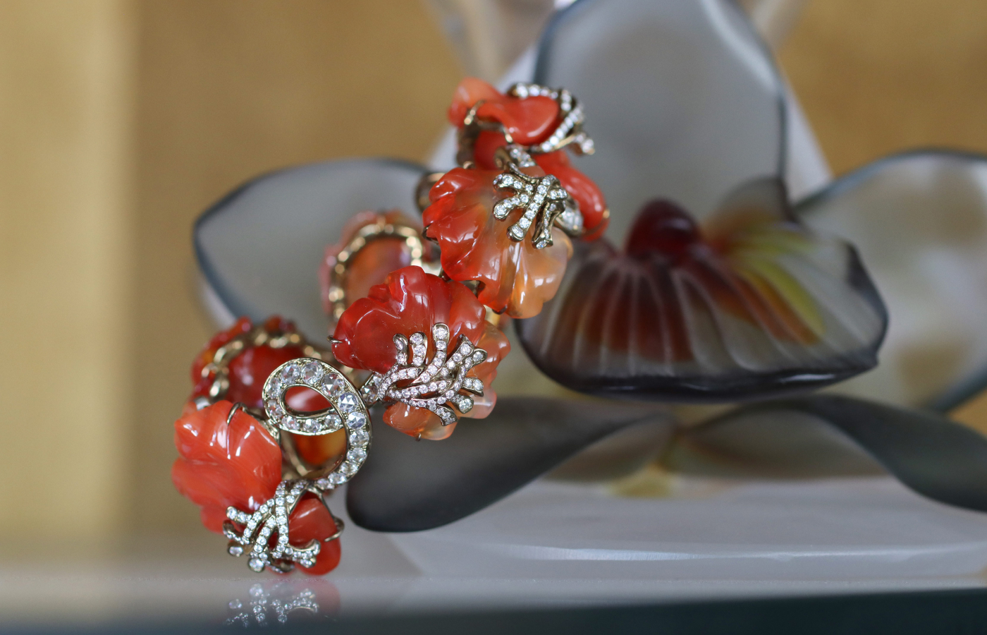 Carved agate bracelet with diamonds set in titanium by Neha Dani 