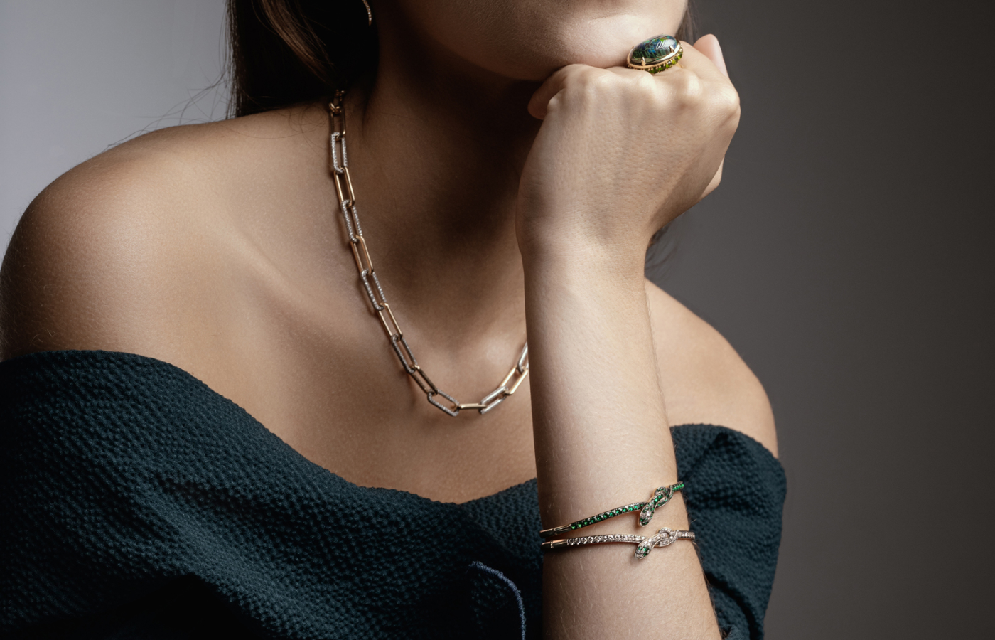 A model wears a pair of Coiled Snake bangles by Ileana Makri